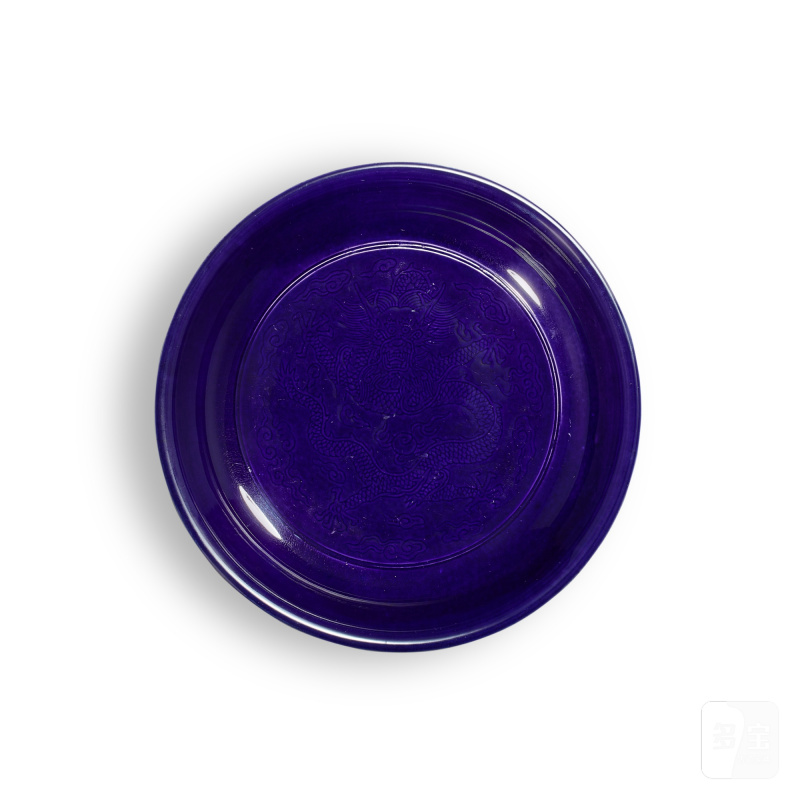 An incised aubergine-glazed 'dragon' dish, Mark and period of Qianlong | 清乾隆 茄皮紫釉暗刻雲龍紋盤 《大清乾隆年製》款